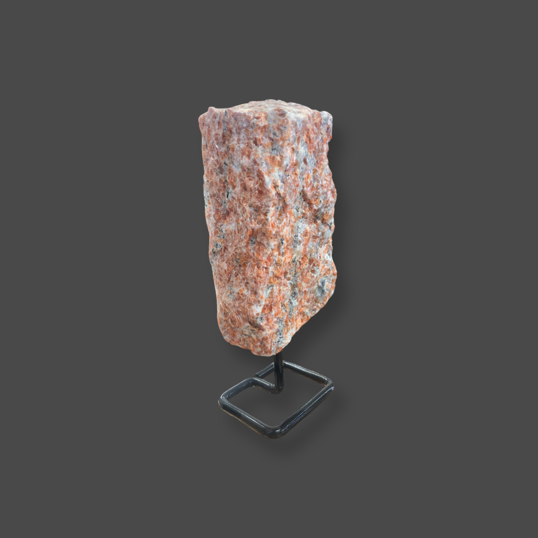 Orange Calcite On A Metal Base