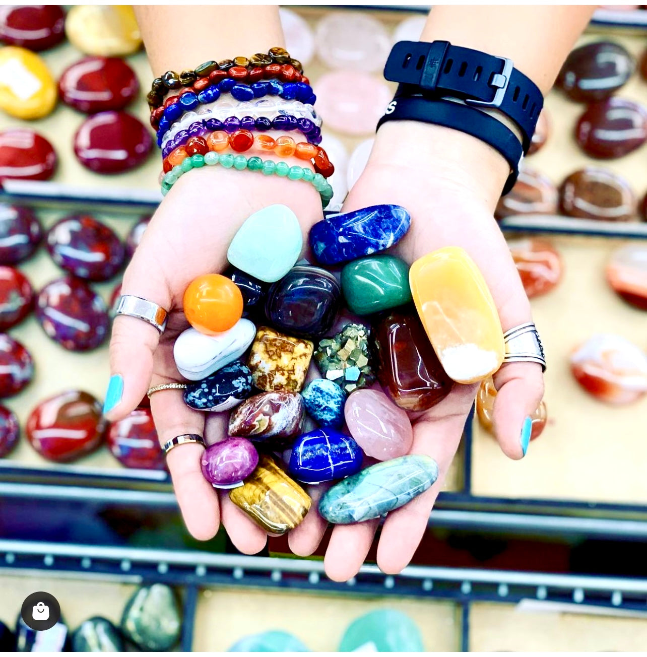 Hand full of tumbled stones